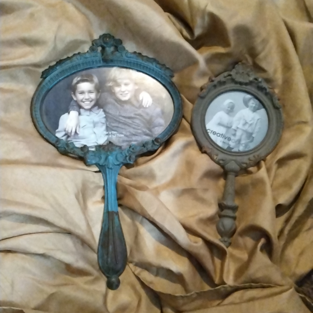 Two wall hanger photo frames one is a 5x7 and other is a 3x5
